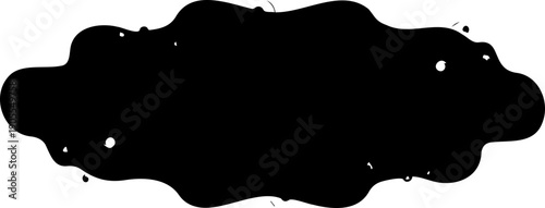 A black ink blot or spill with irregular edges on a white background