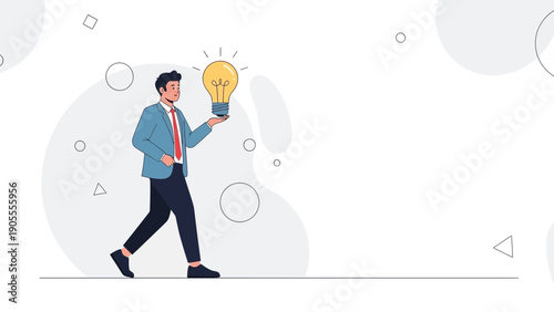 Businessman holding a glowing light bulb, concept of innovation and new ideas