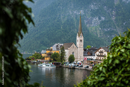 Hallstatt village with church and lake in the Austrian Alps in summer