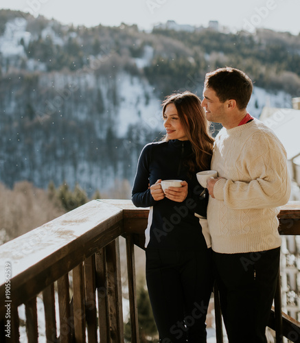 Couple enjoys warm drinks t...