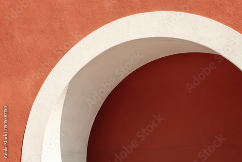 Abstract Architectural Detail Featuring Smooth Curved Arch Against Warm Orange Wall Surface