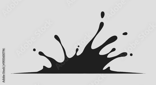 Black Ink Splash on White Surface.