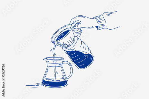 Hand pouring coffee from carafe to pour over coffee maker for brewing fresh hot beverage