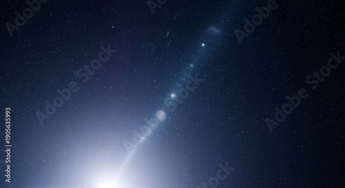 A stunning cosmic display of brilliant blue and white light rays bursting from a central star cluster into deep space.