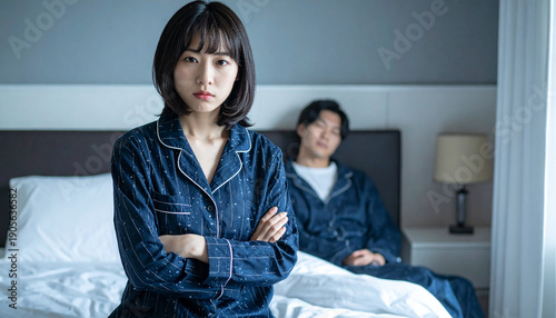寝室で怒っている妻