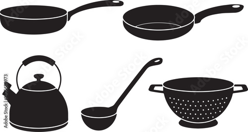 Collection of black kitchen utensils including frying pans kettle ladle and colander