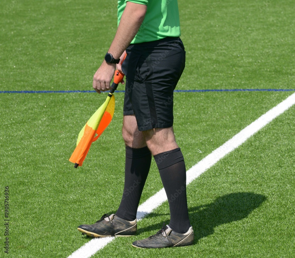 Obraz premium l'arbitre au football