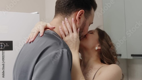 Close up of young caucasian couple kissing with eyes closed, tender and passionate mood, symbolizing love, romance, and deep emotional intimacy.