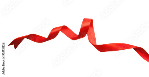 A vibrant red ribbon flowing and twisting across a white background