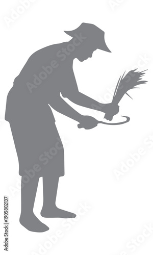 Farmer harvesting crops silhouette