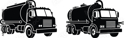 Two black and white tanker trucks parked side by side on a flat surface