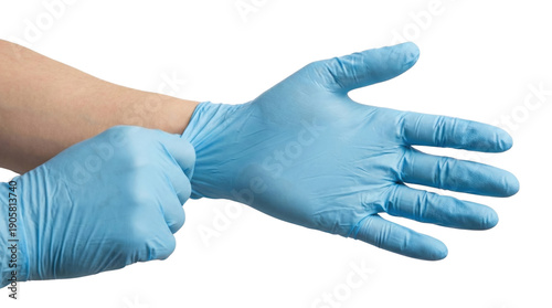 Fotografie Close up of hands putting on blue medical glove on transparent background