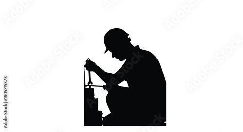 Silhouette of a worker operating a machine with levers and gauges