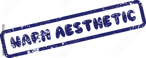 Distressed blue rectangular rubber stamp impression revealing the stylish phrase Warm Aesthetic