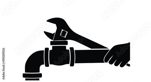 A black silhouette depicting a hand using a wrench on a pipeline