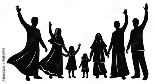 Family celebrating together in traditional attire with joyful dance