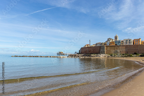 Termoli, seaside gem of Molise, unites a colorful medieval borgo on a rocky promontory, Swabian castle, Romanesque cathedral and wide sandy beaches lapped by the Adriatic.