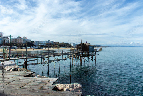 Termoli, seaside gem of Molise, unites a colorful medieval borgo on a rocky promontory, Swabian castle, Romanesque cathedral and wide sandy beaches lapped by the Adriatic.