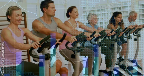 On class cue six riders pedaling on spin bikes in fitness class, HUD overlays tracking performance