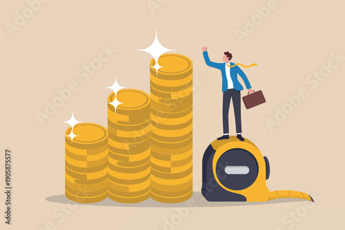 Businessman standing on gold coins with a megaphone celebrating success