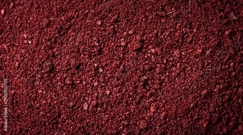 Vibrant red sumac spice powder texture, ideal for culinary backgrounds, food photography, and healthy ingredient visuals.
