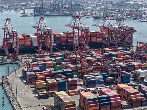 Quadro em tela Aerial view of a huge port terminal for container ships in the process of loadin