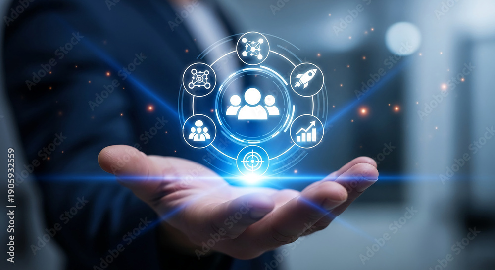 Fototapeta premium Hand holding glowing business icons representing teamwork, goal, startup, graph, and network, showcasing connection, achievement, and progress
