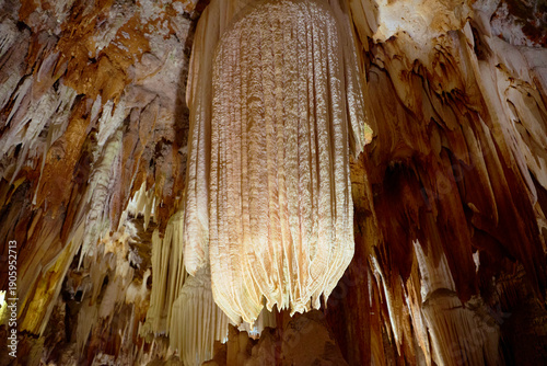 Panoramic view of a cave roof with diverse mineral formations