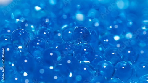 Fotografi Macro shot of transparent blue hydrogel spheres