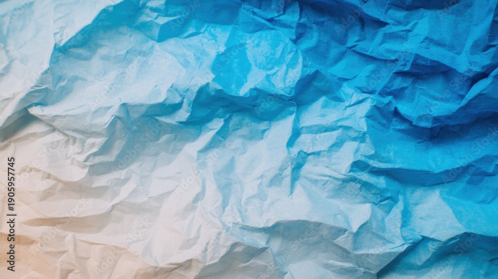 Obraz premium Crumpled paper texture with blue and white shades in simple design