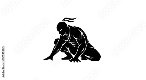Ninja silhouette in crouching position