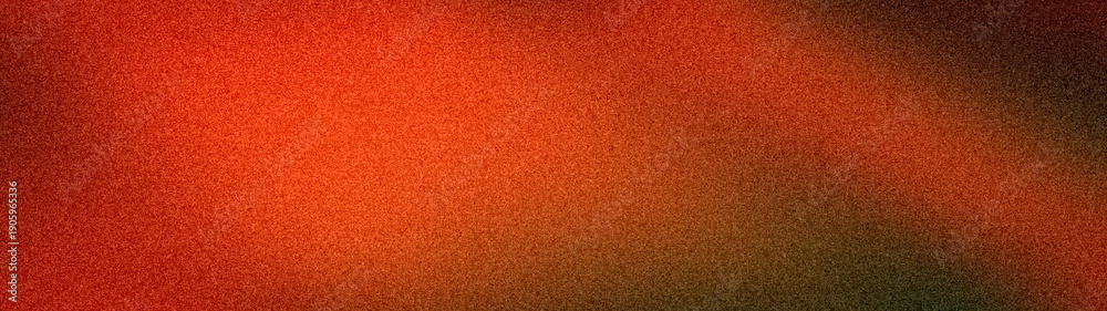Fototapeta premium Wide abstract background with fiery red, orange, and dark black tones. Grainy blurred texture creates an intense, cinematic backdrop for banners and designs