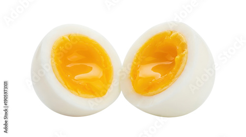 Soft boiled egg cut in half with runny yellow yolk isolated on transparent background view