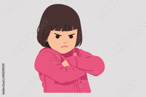 Portrait of a young girl showing an angry facial expression.