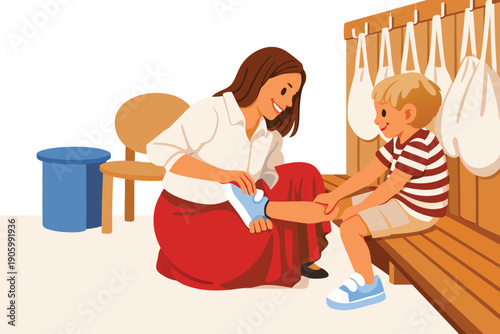 Mother helping her young son put on shoes in a hallway.