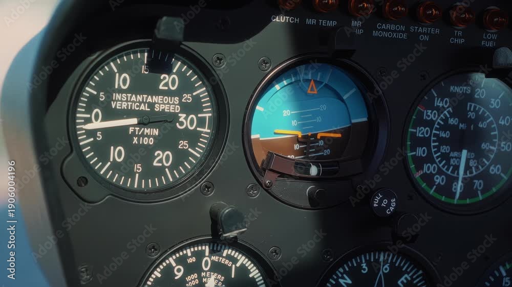 Instrument panel of a helicopter cockpit showing vertical speed ...