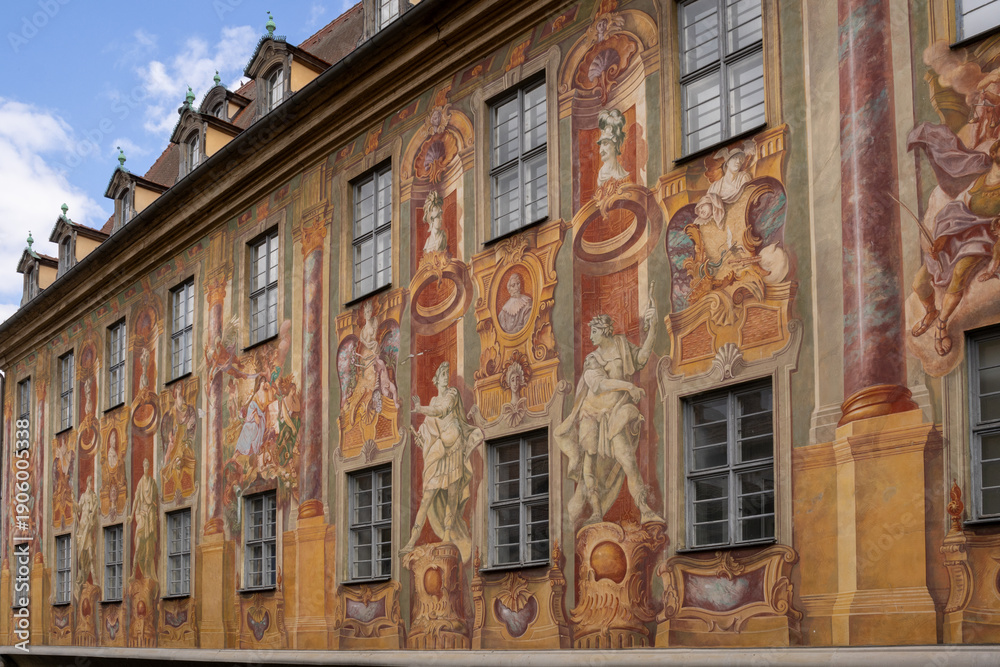 Fototapeta premium Altes Rathaus in Bamberg, Bavaria, Germany, iconic old town hall on an artificial island in the Regnitz River, connected by pedestrian bridges including Untere Brücke, featuring porcelain museum 