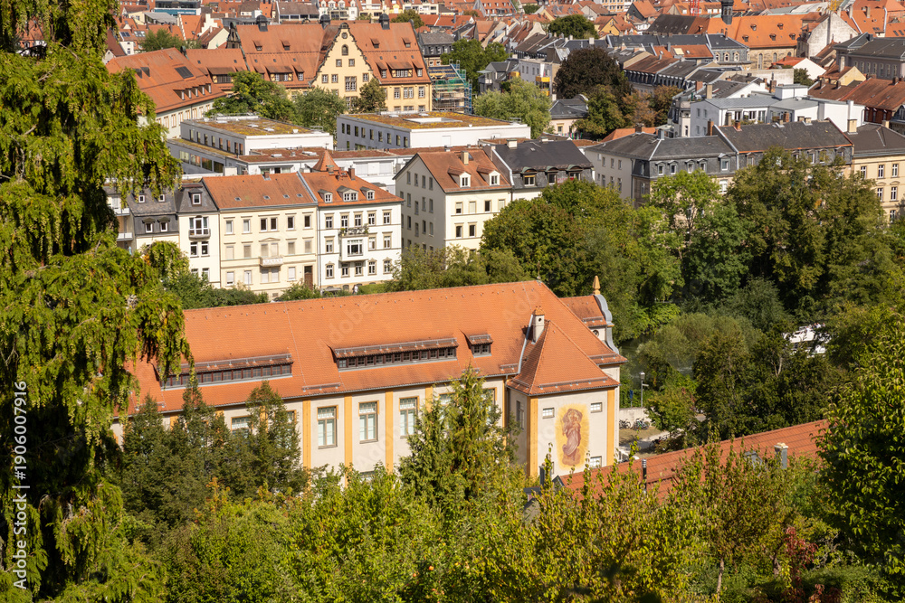Obraz premium View from Michelsberg Monastery (Kloster St. Michael) in Bamberg, Bavaria, Germany, overlooking historic old town, vineyards and gardens, scenic UNESCO city panorama and European travel landmark.