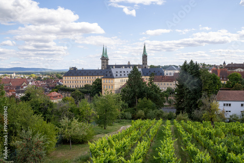 View from Michelsberg Monastery (Kloster St. Michael) in Bamberg, Bavaria, Germany, overlooking historic old town, vineyards and gardens, scenic UNESCO city panorama and European travel landmark.