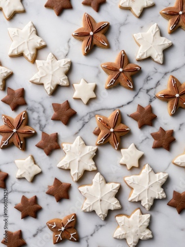 Flat lay of Christmas cookies and cinnamon on marble table