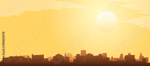 Golden yellow panoramic poster of the city skyline with misty background buildings and clouds of BERLIN, GERMANY