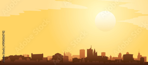 Golden yellow panoramic poster of the city skyline with misty background buildings and clouds of VIENNA, AUSTRIA