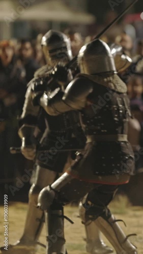 Show of gladiatorial fights on the street surrounded by people