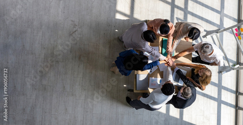 Konstfotografi Top view of entrepreneurs team and startup have business meeting and encouraging