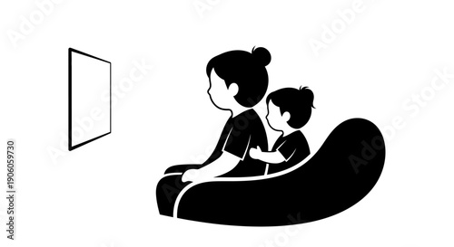Mother and child watching television together on a couch.