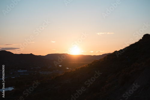 Canvas Print Golden Sunset Over Rugged Terrain