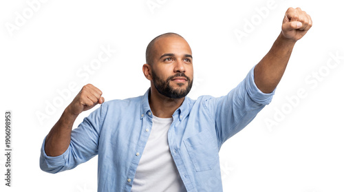Determined confident man with dark beard raising both fists high into the air signaling strong achievement and powerful victory on transparent background