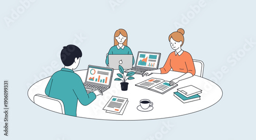 Three colleagues collaborating around a circular table with laptops and documents in a modern office setting from an overhead viewpoint.
