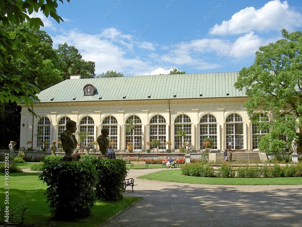 Fototapeta premium WARSAW, POLAND: The Old Orangery and historical architecture in Royal Lazienki Park, featuring grand windows and classicist design.