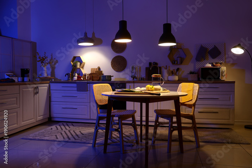 Interior of dark kitchen wi...